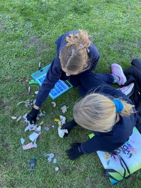 Students sorting beach litter into categories for adding to the Litter Stopper app. Source: Coastcare Victoria.