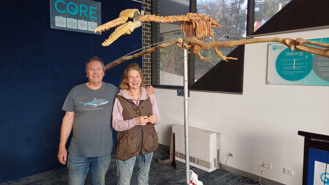 Sandra and Murray in front of a model of Pelagornis.